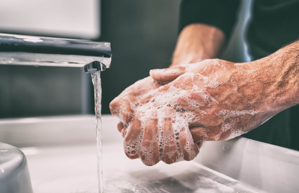 Man washing his hands